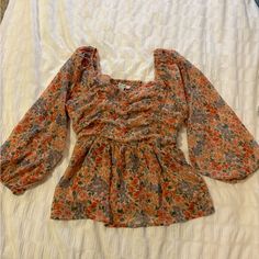 American Eagle Baby Doll Blouse Never Worn Size Small. Pretty Pink And Coral Colored Spring Multicolor Square Neck Tops, Multicolor Square Neck Tops For Spring, Cute Long Sleeve Red Blouse, Cute Red Long Sleeve Blouse, Cute Long Sleeve Orange Top, Cute Long Sleeve Floral Print Tops, Cute Fall Blouse For Brunch, Red Square Neck Top For Spring, Cute Floral Print Tops For Fall