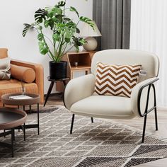 a living room filled with furniture and a potted plant