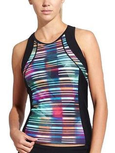 Athleta Multi Streamline Tri Tank Top Multi-Color Size XXS NEW WITH TAGS Athleta's resident lap swimmer set out to design the ultimate suit with the perfect, stay-put fit while flattering your form (consider it done). Nylon/Spandex LYCRA® XTRA LIFE™ SPANDEX. Ultra-resilient fabric snaps back like a pro and lasts 5-10x longer RATED UPF 50+ (Excellent Protection) Breathable, sleek, stretchy Imported Hand wash. Performance-fitted Hugs your body for a performance edge INSPIRED FOR: triathlon, perfor Multicolor Sleeveless Sports Top, Multicolor Racerback Athleisure Activewear, Multicolor Racerback Activewear Athleisure, Casual Multicolor Racerback Activewear, Multicolor Moisture-wicking Racerback Activewear, Multicolor Racerback Activewear For Summer, Sporty Multicolor Racerback Activewear, Sporty Multicolor Racerback Top, Multicolor Athleisure Tops For Gym