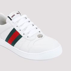 These kicks are the epitome of laid-back luxury, blending classic Italian craftsmanship with a playful pop of color. They're the kind of sneakers you can dress up or down without missing a beat. Trust us, your feet will thank you. Premium white leather with iconic green and red web Embossed GG leather insert for that signature touch Enameled oval metal detail with Double G Gucci logo on the tongue and back Durable rubber sole Made in Italy Season: FW24 100% Leather composition | Gucci Women's Sc Red Web, White Leather Sneakers, Buy Gucci, Leather Cap, Logo Pattern, Mens Gloves, Mens Fall, Green And Red, Beach Tote Bags