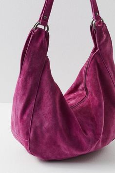 Effortlessly functional, this tote bag is featured in a slouchy hobo style with two elongated shoulder straps, all in soft suede fabrication with zipper closure for the perfect go-to bag.Fully lined, Zipper closure, Fixed strapsSuede, Cotton Suede Tote Bag, Free People Bags, Slouchy Bag, Suede Tote, Hobo Style, Boho Bags, Pink Tote, Women Men Shoes, Soft Suede