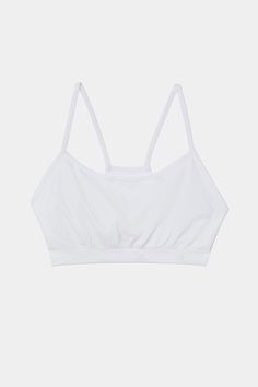 An easy to wear seamless bra designed to go from gym to everyday...seamlessly. Chafe-free fabric lets you move with easy and layers beautifully under any top. BEST FOR: running, yoga, crossfit, barre, pilates, spin class or gym workouts. Model is 5'10" and wears a size XS/S. Basic Everyday Seamless Crop Top, Cotton Gym Activewear With Built-in Bra, Sports Tank Top With Built-in Bra And Minimal Stretch, Micro-elastic Crop Top With Built-in Bra For Yoga, Micro-elastic Gym Bra With Built-in Support, Everyday Compressive Sports Bra With Built-in Bra, White Activewear With Built-in Bra For Everyday, Gym Activewear With Built-in Bra And Minimal Stretch, Supportive Gym Bra With Built-in Support