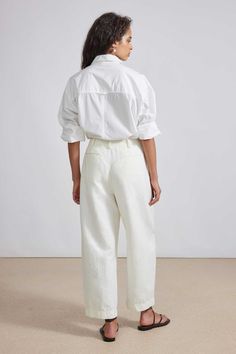 60% Linen, 40% Organic Cotton Made in China High waist, cropped barrel leg, hook and bar closure, slant pockets Dry clean recommended, or machine wash cold on gentle cycle and lay flat to air dry Fits true to size. Select your usual size Leg Pants Outfit, White Linen Pants, Satin Blouse, Cropped Trousers, Bari, Linen Pants, Pants Outfit, White Linen, Air Dry