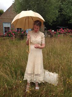 A very beautiful tulle lace dress with a lovely tiny floral pattern, and lace ruffles it has a cream color This dress has a bit stretch and will  a fit waist  70 cm  27.5" bust 88 cm   34.5" total length of the dress:  145 cm 57" This dress has many discolorations and repairs.  I saw several tiny holes, and there is brown underarm discoloration (picture 8) The dress is very beautiful because f the wonderful floral lace, the lace ruffles, the embroidery work and it's shape... My model is wearing Beige Lace Patchwork Dress For Garden Party, Cream Lace Dress With Patchwork For Garden Party, Cream Lace Dress With Fitted Bodice And Lace Trim, Cream Fitted Lace Dress For Garden Party, Fitted Lace Dress With Lace Sleeves For Garden Party, Cream Lace Dress With Fitted Bodice, Fitted Beige Lace Dress With Lace Patchwork, Beige Lace Dress With Ruffles, Fitted Beige Lace Dress