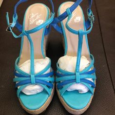 Brand New Never Worn. Color Is Turquoise. Strappy Wedge, Jute Heel, Approx 4” High. Gorgeous Summer Wedge. Blue Synthetic Wedge Sandals With Ankle Strap, Blue Synthetic Ankle Strap Wedge Sandals, Blue Wedge Heel Sandals With 4-inch Heel, Blue Wedge Sandals With Platform And Round Toe, Blue Wedge Heel Sandals With Removable Insole, Blue Platform Wedge Sandals With Round Toe, Blue 4-inch Wedge Heels, Blue Wedge Sandals With Removable Insole, Blue Closed Toe Synthetic Wedge Sandals