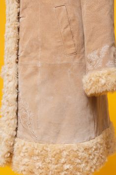 "Follow our Instagram for updates @fantasia_superstar FB: https://www.facebook.com/fantasiasuperstar We're open to reasonable offers ♡ Amazing 60s 70s inspired beige suede leather & faux fur coat ⫸ Super rare and beautiful ❀ Penny Lane ❀ It's really gorgeous!! ⫸ Condition: Beautiful vintage pre-loved condition. Without any odors. Some teeny-tiny marks on the leather but REALLY nothing noticeable. Please see the pictures <3 ⫸ Lined with soft silky polyester ⫸ Amazing floral embroidery on f Beige Winter Outerwear For Festivals, Fitted Beige Outerwear For Festivals, We're Open, Beige Coat, Penny Lane, 1970s Fashion, Dec 30, 70s Inspired, Faux Fur Coat