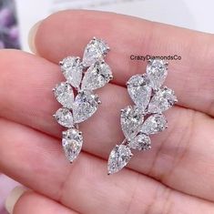 Tear Drop Cluster Earrings, Pear Cut Moissanite Diamond Wedding Earrings, 14k White Gold Screw Back Earrings, Women's Stud Drop Earrings ✹✹𝐖𝐞𝐥𝐜𝐨𝐦𝐞 𝐭𝐨 𝐂𝐫𝐚𝐳𝐲𝐃𝐢𝐚𝐦𝐨𝐧𝐝𝐬𝐂𝐨✹✹ Detail about stones Moissanite & Simulated Stone: ----------------------------- Stone Shape: Pear Cut Stone Size: 6X4 mm, 5X3 mm, 4X3 mm  Stone Weight : 4.34 TCW Color: Colorless Cut: Excellent Clarity: VVS ★ 𝑰𝒕𝒆𝒎 𝑫𝒆𝒕𝒂𝒊𝒍𝒔:- ☛ Metal Purity: Solid Gold (10KT, 14KT, 18KT); Silver(925 Sterling, 935 Argentium), 950 Platinum ☛ Metal Tone: Yellow, White, Rose ☛ Stamp/Hallmark: Yes ★ 𝑪𝒖𝒔𝒕𝒐𝒎𝒊𝒛𝒂𝒕𝒊𝒐𝒏:- ☛ Customized Design Jewelry. ☛ All cuts which you dream to make with moissanite. ☛ Updating every step of your ordered jewelry(Loose Stone, CAD & Making Process) ☛ All listed items in our s Pear-shaped Silver Earrings With Diamond Cut, White Pear-shaped Cluster Earrings For Formal Occasions, Pear-shaped Fine Jewelry Earrings For Wedding, Pear-shaped Bridal Earrings With Prong Setting, Fine Jewelry Bridal Earrings In Diamond White, Pear-shaped, White Teardrop Hand Set Diamond Earrings, White Gold Pear-shaped Earrings For Anniversary, White Hand Set Teardrop Diamond Earrings, Fine Jewelry White Pear-shaped Earrings