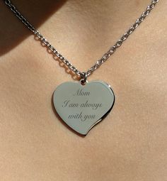 "Our engraved silver heart necklace is a great personalized gift for that special someone. The silver heart necklace can be custom engraved with names, dates or a message of love on both sides of the heart pendant. This high polished stainless steel pendant will never tarnish or fade or change color. Great gift for bridesmaids, flower girls, best friends, or the love of your life. Silver Teardrop Heart Necklace Dimensions: 1.25\" X 1\" Material: Stainless Steel Includes stainless steel chain How Mother's Day Stainless Steel Heart Pendant Necklace, Mother's Day Heart Pendant Necklace In Stainless Steel, Stainless Steel Heart Pendant Necklace For Mother's Day, Personalized White Gold Heart Necklace For Mother's Day, Personalized Stainless Steel Heart Necklace For Mother's Day, Engraved Double Heart Necklace For Memorial, Memorial Double Heart Engraved Necklace, Personalized Stainless Steel Heart Necklace, Memorial Mother's Day Double Heart Necklace