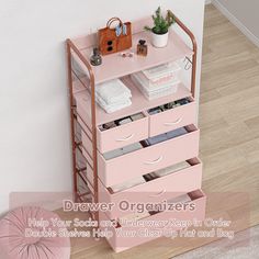 a pink drawer organizer with drawers on it