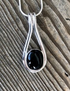 Excited to share this item from my #etsy shop: Sterling Silver Black Onyx Pendant Necklace #renegadetrading #silver #onyx #onyxpendant #onyxnecklace #silverpendant #sterlingpendant #silvernecklace Black Onyx Pendant, Silver Threader Earrings, Onyx Pendant, Onyx Necklace, Sterling Silver Necklace Pendants, Labradorite Pendant, Silver Pendant Necklace, Black Onyx, Vintage Sterling Silver