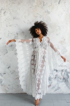 "Clarisa is a classic from our Bibiluxe lace collection  An all over embroidered ivory lace kaftan, with a stunning scallop border all around. * Unlined Kaftan only  *Available in 3 lengths    44' mid length    53\" petite maxi length    59\" tall maxi length ( model is wearing 59\" length )   * Made to Order approx 2-3 weeks * Custom sizes available please enquire SIZES  SMALL / MEDIUM Fits Hips / Bust to up to 40\" FITS UK sizes 6-10 / Euro 34-38 / US 4-8  Actual garment measurements bust / hi Fitted Lace Cover-up With Lace Trim, V-neck Lace Gown With Lace Trim, Flowy Lace Dress With Delicate Details, Flowy Lace Dress With Lace Sleeves, Flowy Scalloped Lace Dress, Floor-length Lace Gown With Lace Patchwork, Lace Wedding Night Dress With Lace Trim, Lace Maxi Dress For Beach Cover-up, Bohemian Flowy Dress With Delicate Lace