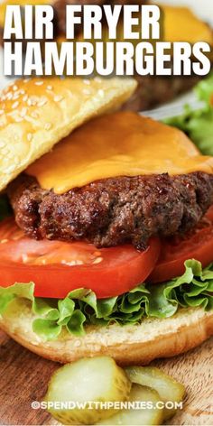 an air fryer hamburger with lettuce tomato and cheese