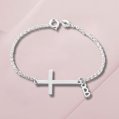 Personalized Cross Bracelet Dainty Bracelet Silver Cross Bracelet Silver Jewelry Christian Bracelet Initial Bracelet Religious Jewelry Material: Sterling Silver, 24k Gold Plating, Rose Gold Plating Thickness: 0.7mm / 0.03″ Chain Style: Rolo Chain Pendant Size: 25mm x 14mm / 1.0" x 0.6" 5.5" Chain (14cm) - Avg. child's wrist 6.5" Chain (16.5cm) - Avg. woman's wrist 7.5" Chain (19cm) - Avg. woman larger wrist All items purchased will be shipped within 1-5 business days with a tracking code. USA - Silver Cross Bracelets For Gifts, Elegant Personalized Cross Bracelets, Elegant Silver Cross Beaded Bracelets, Metal Rosary Bracelet As Gift, Adjustable Cross Chain Bracelet As Gift, Elegant Silver Beaded Cross Bracelets, Elegant Cross Metal Bracelets, Metal Cross Bracelets, Elegant Metal Cross Bracelet