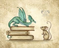 a green dragon sitting on top of a pile of books next to a small mouse