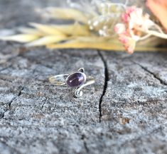 Cat Ring Details:-Choice of Natural Rainbow Moonstone, Dominican Larimar, or Natural Amethyst- 12mm face height- 2mm smooth round band- .925 solid sterling silver- Available in US ring sizes 4-10.5 with 1/2 sizes. 💜Connect with us on Instagram @a_wild_violet for sales and giveaways!**All items are in stock and ship within 2-5 business days from received payment (excluding Saturday/Sunday) from the US. If you are within the US please expect 3-7 business days for shipping transit and delivery. In Purple Moonstone Round Jewelry, Adjustable Amethyst Ring With Natural Stones, Cat Ring, Natural Rainbow, Ring Sizes, Saturday Sunday, Rainbow Moonstone, Shop Earrings, Ring Sets