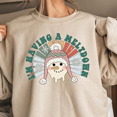 I'm Having a Meltdown Sweatshirt, Playful Xmas Gift, Humorous Santa Claus Hoodie, Xmas Family Reunion, Xmas Party Sweatshirt, Gift For Mom 🎁 Welcome to SAKA Apparel Co! We want to provide you with a delightful shopping experience, and we're here to assist you every step of the way. 🔍 Prior to finalizing your purchase, we recommend examining the images closely to ensure the size, color, and theme align with your preferences. Your satisfaction is our priority! 👕 Personalize your shirt effortlessly by selecting your preferred size and color from the easy-to-use menus. In the provided box, kindly specify your desired design color, referring to the available colors in the listing photos. 🔢 Need multiple shirts? No problem! Choose the quantity you desire and conveniently add them to your car Family Family, Thanksgiving Shirts, Xmas Party, Family Reunion, Xmas Gifts, Gift For Mom, Santa Claus, Sweat Shirt, Gifts For Mom