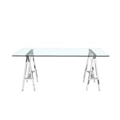 a glass table with metal legs on it