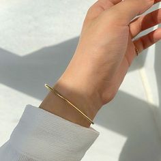 Say "hello" to timeless elegance with these stackable 18K Gold Plated Stainless Steel Bangles. Crafted from quality stainless steel and with its beautiful minimalist design, these lovely bracelets are both chic and durable, perfect for your next night out. The tarnish-free finish ensures they'll keep their shine for years to come. Add a touch of luxury to your look with these classic pieces! Stackable Bangles, Stainless Steel Bangles, Bangles Jewelry, Minimalist Jewelry, Delicate Bracelet, Say Hello, Minimalist Design, Timeless Elegance, Bangle Bracelets