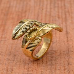 "Feather Ring, Handmade Ring, Boho Ring, Feather Ring For Women, Adjustable Ring, Gold Ring, Thumb Ring, Dainty Ring, Hippie Ring, Gift Ring Material :- Brass,Silver,Gold,Rose Gold Plated ❥ Add this beautiful one little thing of galactic shine to make you feel unique and to transform your lives. Perfect for any kind of outfit and every occasion. ❥ Customers satisfaction is our biggest priority, please contact us with any questions/queries for future or existing orders, and we will do our best to make sure you are happy with your order. ❥Please make sure to add the correct address during check out. You can return your purchased item within 15 days after successful delivery. We offer a 100% \"Money Back Guarantee\" if you are not satisfied with your purchase. Return charges will be paid by b Bohemian Brass Rings For Jewelry Making, Nature-inspired Brass Rings For Gifts, Adjustable Brass Flower Ring, Peacock Feather Ring, Hippie Ring, Hippie Rings, Feather Ring, Thumb Ring, Real Jewelry