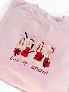 Get festive with our Snow Girls Crewneck Sweatshirt! Rep your Mean Girls attire for this holiday season! The Unisex Sizing makes the sweatshirt run slightly larger than your average sweatshirt for women. Most men find their normal size to be more snug. If you want a slightly looser fit, size up one size. Please check out our size chart for measurements to ensure an accurate fit. PLEASE BE SURE TO INPUT YOUR CORRECT SIZE/COLOR + SHIPPING ADDRESS. We will not be responsible if it is incorrect! Ref Winter Crew Neck Pink Top, Winter Pink Crew Neck Top, Pink Crew Neck Top For Winter, Pink Cotton Holiday Sweatshirt, Cute Winter Holiday Sweatshirt, Cute Sweatshirt For Holiday Winter, Cute Holiday Crew Neck Sweatshirt, Cute Crew Neck Sweatshirt For Holiday, 12th Birthday Party Ideas