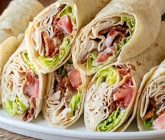 ~INGREDIENTS~
4 large tortillas
8 oz. deli sliced chicken breast
8 strips thick cut bacon, cooked crisp
2 cups lettuce leaves
1/2 cup diced tomatoes
4 tbsp ranch dressing

~INSTRUCTIONS~
Cook your bacon until nice and crisp
Assemble the wraps by laying a large flour tortilla down and then top with lettuce, diced tomatoes, ranch dressing, bacon and sliced chicken breast.
Use deli sliced chicken breast for a super quick wrap.
Roll up the wraps tightly and use a sharp knife to cut in half. Easy Paleo Lunches, Bacon Ranch Wraps, Ranch Wraps, Chicken Bacon Ranch Wrap, Clean Eating Lunch, Chicken Bacon Ranch, Easy Lunch Recipes, Bacon Ranch, Lunch Recipes Healthy