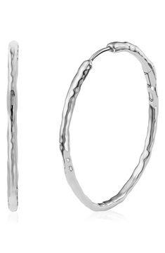 These organically shaped, high-polished hoops are beautiful worn solo, but also can be accessorized with Monica Vinader pendant charms, sold separately. Hidden-post closure Hinge allows the addition of charms, sold separately Sterling silver or sterling silver with 18k-gold vermeil Imported Exclusive US retailer Elegant Hammered Sterling Silver Hoop Earrings, Small Hammered Metal Hoop Earrings, Hammered Metal Hoop Jewelry, Elegant Hammered Hoop Earrings, Elegant Hammered Round Hoop Earrings, White Gold Hoop Jewelry, Classic Hammered White Gold Jewelry, Sterling Silver Hoop Jewelry With Shiny Finish, Modern Small Hoop Jewelry With Shiny Finish