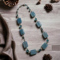 "This chic beaded necklace is perfect for any woman who loves a touch of elegance. It's made from baby blue glass and crystal beads, and measures 22 inches in length. The geometric pattern adds a unique twist to this fashionable piece. * 22 inch length * Made from glass and metal * Geometric pattern * Baby blue and clear beads * Beaded style * Perfect for women Features: * Beaded * All Seasons * Geometric * Hand Wash Size: Womens 22\" Measurements: Length 36 in / 91 cm Condition: Pre-Owned Good This item is in great pre-owned condition.  It has been sonic cleaned and kept in a home with no pets/smoke.  Thank you for considering my store.  As a small business owner, I handle all your items personally and I appreciate my customers greatly.  If you should have any questions, please do not hes Light Blue Polished Beads Necklace For Gift, Elegant Light Blue Beaded Chain Necklaces, Elegant Light Blue Beaded Chain Necklace, Adjustable Light Blue Necklaces With Natural Stones, Light Blue Gemstone Beaded Necklace Gift, Light Blue Gemstone Beads Necklace For Gift, Adjustable Light Blue Gemstone Beaded Necklace, Rectangular Blue Necklace With Natural Stones, Blue Rectangular Natural Stone Necklace