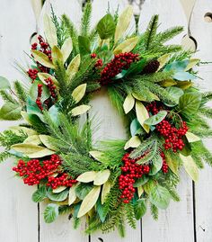 Traditional red and green artificial Christmas wreath with red berries for front doors Add a touch of timeless elegance to your holiday decor with this beautifuly handcrafted Christmas greenery wreath with red holly berries, pine, cedar, and brushed gold sprays! This stunning wreath is a perfect blend of classic holiday colors and natural looking elements, featuring: 🌟 Vibrant greenery and red holly berries: Beautiful eucalyptus, pine and cedar artificial greenery, and beautiful bright red holly berries.  Please let me know if I can answer any questions. I will quickly respond. Thank you for visiting my shop. Happy Shopping! 🛍 Christmas Double Door, Christmas Greenery Wreath, Holly Berry Wreath, Traditional Christmas Wreath, Double Door Wreaths, Artificial Christmas Wreaths, Holiday Greenery, Artificial Greenery, Berry Wreath