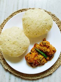 two different types of food on a white plate