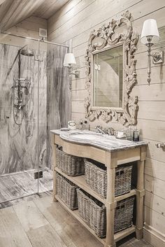 a bathroom with a sink, mirror and shower