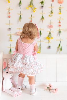 Embrace the joy of springtime sweetness with this precious baby romper by Be Girl Clothing. Crafted with attention to detail, this adorable romper captures the essence of the season. Perfect for sunny days and playful moments. Pre-Order item only: This item is for pre-order. Secure your size by placing a pre-order for this item. We will ship your items promptly when they arrive at our shop. Our orders were placed this past year and all styles/sizes you see under pre-order should arrive to our sh Girls Wardrobe, Girl Clothing, Baby Romper, Spring Time, Sunny Days, Pre Order, Girl Outfits, Essence, Rompers