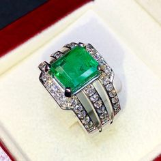 BRAND-NEW!! ONE OF A KIND, HANDCRAFTED RING. EXQUISITE AND FINE CRAFTSMANSHIP! HANDMADE TO LAST FOR AN ETERNITY!! HEIRLOOM PIECE!! PRECIOUS JEWELRY TO BE PASSED ON! PERFECT DRESS RING FOR A LADY OR A GENTLEMAN! 4.25 total carats weight, Certified, Natural emerald ring. This ring offers an important statement of who you are with a jumbo 3.51 carats, VIVID GREEN, transparent, ZAMBIAN EMERALD. Accentuating the EMERALD are the 40 SUBSTANTIAL E/VS, sparkling natural diamonds SUGGESTED RETAIL VALUE: $ Gia Certified Tsavorite Diamond Ring For Formal Occasions, Classic Formal Tsavorite Diamond Ring, Formal White Gold Diamond Ring With Tsavorite, Luxury Tsavorite Rings For Anniversary, Classic White Gold Tsavorite Ring, Formal White Gold Emerald Signet Ring, Luxury Gia Certified Signet Ring As Gift, Green Engagement Rings, Colombian Emerald Ring