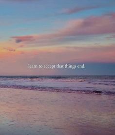 a person walking on the beach with an ocean in the background that says learn to accept that things end