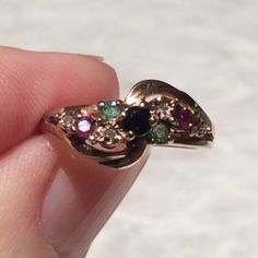 Stunning Vintage diamond, ruby, emerald, and sapphire 9ct swirl gold ring.Here we have a lovely sparkly multi stone ring,  set with sparkly diamonds, faceted rubies, emeralds and sapphires, set in a gold swirl pattern. The ring has simple gold openwork shoulders and dates from the 1970’s.The ring is in a good Vintage condition. The stones are in a good condition and are firmly gold claw set. The ring is fully hallmarked for 9ct gold.A lovely statement stacking or just a stand alone ring.Measures Anniversary Multicolor Rose Cut Diamond Rings, Rose Gold Moonstone Ring, Gold Moonstone Ring, Future Engagement Rings, Swirl Ring, Ruby Emerald, Red Band, Gold Necklace Designs, Swirl Pattern