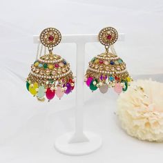 HIRA Antique gold reverse AD polki stine Beaded Jhumka/jhumki Earrings with earchain/sahare. Earrings Drop Lenth: 7CM Drop width:3.5CM   We try to take pictures as natural as we can but color may vary due to camera light setting. Festive Dangle Jhumkas With Tilla, Dangle Jhumkas For Diwali Festivities, Festive Dangle Jhumkas For Diwali, Multicolor Kundan Jhumkas With Cutdana, Multicolor Temple Jewelry Jhumkas For Celebration, Multicolor Chandbali Jhumkas With Cutdana, Multicolor Chandbali Jhumkas For Festive Occasions, Kundan Jhumkas With Latkans For Celebrations, Festive Multicolor Chandbali Jhumkas