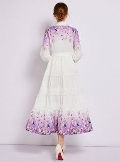 Captivating and ethereal, this enchanting long-sleeved dress is a portrait of bucolic elegance. Its fitted bodice descends into a gently tiered skirt, creating a silhouette that’s both classic and whimsical. The crisp white fabric serves as a canvas for delicate floral patterns that bloom across the hem, lending a touch of springtime regardless of the season. Lace trims add a sophisticated touch, framing the neckline and cuffs with exquisite detail. With a cinched waist accentuated by a self-tie belt, this dress shapes a figure that is both graceful and poised. It’s a versatile piece that transitions seamlessly from a countryside stroll to a chic urban evening. Fabric name: polyester fiberPattern: printingSkirt length: long skirtSkirt type: large swing typeSleeve length: long sleevesColor: Feminine Long Sleeve Midi Dress With Lace Trim, Spring Long Sleeve Dress With Ruffles, Lace Trim Tiered Skirt Dresses For Garden Party, Garden Party Dresses With Lace Trim And Tiered Skirt, Long Sleeve Midi Dress With Ruffles For Spring, Spring Flowy Long Sleeve Dress With Ruffles, Long Sleeve Midi Dress With Ruffle Hem, Spring White Long Sleeve Dress With Ruffles, Summer Long Sleeve Dress With Ruffle Hem