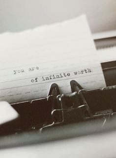 an old typewriter with the words you are one of infinite worth written on it