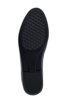 Inspired by an iconic Venetian loafer silhouette, the Brielle conveys an elegant, streamlined aesthetic. Woven embellishment complements the look with a refined textured effect. Stitch 'N Turn technology assures an endlessly flexible, comfortable fit. 3/4" heel Apron Slip-on style Faux leather upper, manmade sole Imported Office Slip-ons With Textured Sole And Almond Toe, Textured Sole Closed Toe Slip-ons For Office, Business Flat Oxfords With Leather Sole, Rubber Sole Flat Oxfords For Business Casual, Flat Oxfords With Rubber Sole For Business Casual, Business Casual Flat Oxfords With Rubber Sole, Flat Leather Sole Dress Shoes For Business, Flat Leather Sole Business Dress Shoes, Business Dress Shoes With Rubber Sole