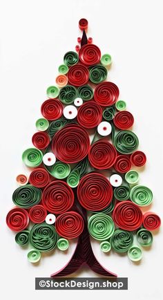 an origami christmas tree made out of red, green and white rolled paper