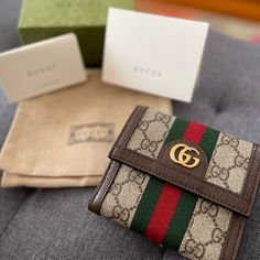 This An ‘Almost New’ Gucci Ophidia French Flap Wallet. Ten Card Slots, Two Billfold Compartments And Separate Coin Compartment. No Any Signs Of Wear At All. Dimensions: 4.75” X 4.5” Gucci Bags Handbags, Gucci Ophidia, Bags Gucci, Gucci Wallet, Gucci Handbags, Gucci Bags, Gucci Bag, Card Slots, Bags Handbags