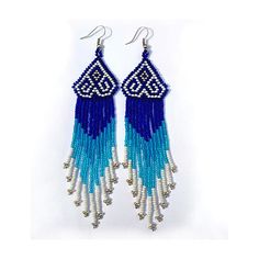 Long Earrings in Native America Style made in Blue, White and Silver colors. Beaded out of Czech seed beads wirh geometrical native patterns. Color and size can be changed! When ordering and you wish a change on the color or design, feel free to write me a short message, everything can be custom made, but please mind that all this needs more time. I want my products to fit you well! White Bohemian Earrings With Heart Beads, Bohemian White Heart Beads Earrings, Bohemian White Earrings With Heart Beads, White Heart Beaded Dangle Earrings, White Bead Earrings, Flag Beads, Handmade Bead Jewellery, Bead Earring, Bead Loom Pattern