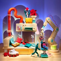 an assortment of toys on display in a room