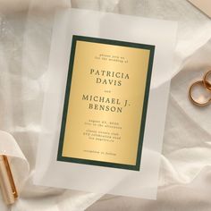 Simple classic modern typography dark emerald green and gold minimalist frosted acrylic wedding invitation.