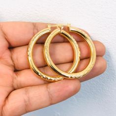 Material: 14k Gold Filled Measurements: 1.8x1.6 Inches Thickness: 5mm Gold 14k Stamped Hoop Earrings For Wedding, Gold 14k Stamped Hoop Earrings As Gift, Gold Hoop Earrings Stamped 14k For Wedding, Gold Hoop Earrings Stamped 14k As Gift, Gold Hoop Earrings Stamped 14k For Gift, Yellow Tarnish-resistant Jewelry, Gold Jewelry With Shiny Finish, Gold Jewelry With Shiny Finish For Anniversary, Gold Round Jewelry With Shiny Finish