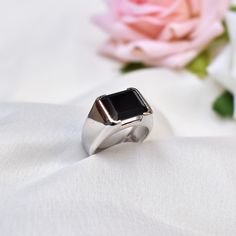 D E T A I L S - Stone: Black Spinel Stone Size: 10x12mm Metal: 925 Sterling Silver The fit: True to US ring size Finish: Silver & Smooth S H I P P I N G & P R O D U C T I O N - My current production time is 2-6 business days, which means after those days are up, your order ships! I make everything custom to order, by hand, but I promise you it's worth the wait! R U S H - M Y - O R D E R - If you're in a rush to get your pretty new pieces, please send me a message and I'll let you know ju Modern Stainless Steel Ring For Formal Occasions, Modern Stainless Steel Ring For Formal Events, Minimalist Stainless Steel Rings For Formal Occasions, Anniversary Stainless Steel Open Signet Ring, Classic Silver Emerald Ring For Proposal, Elegant Silver Stainless Steel Signet Ring, Black Stainless Steel Couple Rings For Promise, Black Stainless Steel Signet Promise Ring, Modern White Gold Jewelry For Proposal