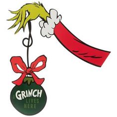 the grinch ornament is hanging from a christmas tree with a red ribbon