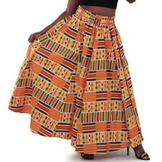 Material: 100% Cotton Color: Multi Measurements: Size: One Size | Waist: Up To 52'' | Belt Straps: 37'' | Length: 40 1/2'' Details: Matching Headwrap 2 Side Pockets Elastic Waist With Belt Straps Attached Wash In Cold Water African Suit, Kente Print, African Prom Dresses, African Skirts, Print Maxi Skirt, Boho Sweater, Poncho Tops, Long Maxi Skirts, Printed Maxi Skirts