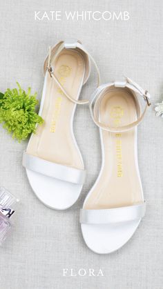 Bridal Shoes Flats - Style Flora Kate Whitcomb White Sandals For Spring Bridesmaid, White Sandals For Bridesmaid In Spring, Feminine Closed Toe Wedding Sandals, Feminine Low Heel Sandals For Weddings, Elegant Ankle Strap Flats With Removable Insole, Elegant Summer Wedding Flats, Elegant Wedding Flats For Summer, Open Toe Summer Wedding Flats, Summer Wedding Flats With Round Toe