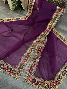 Purple organza dupatta with multi colored embroidered border. Purple Organza Dupatta, Purple Embroidered Semi-stitched Dupatta, Purple Embroidered Fabric With Intricate Design For Designer Wear, Purple Embroidered Fabric With Intricate Embroidery For Designer Wear, Designer Purple Fabric With Intricate Embroidery, Purple Intricate Embroidered Georgette Fabric, Purple Embroidered Unstitched Suit For Eid, Embroidered Purple Salwar Kameez In Chinon, Bollywood Style Unstitched Chinon Suit With Embroidered Border