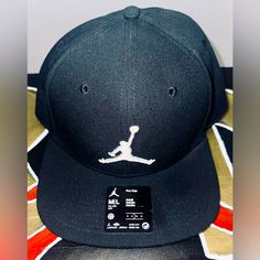 M/L Jordan Hat Brand New Eith Tags!!! Hat Has Never Been Worn, Ordered It For A Gift And It Arrived Late. My Loss Is Your Gain. Jordan Hats, Jordan Black, Jordans For Men, Accessories Hats, Jordan, Mens Accessories, Black White, Man Shop, Brand New